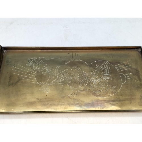 85 - Brass Footed Rectangular Tray with Handles. With 4 Claw Dragon Design. 4cm High, 38cm x 16cm.