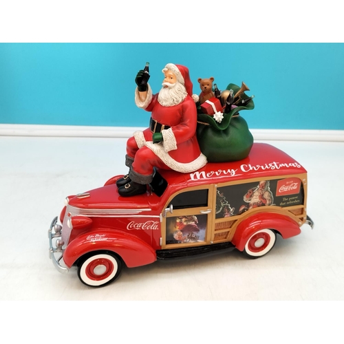 91 - The Hamilton Collection Coca Cola 'Christmas Woody Wagon'. 27cm x 21cm.