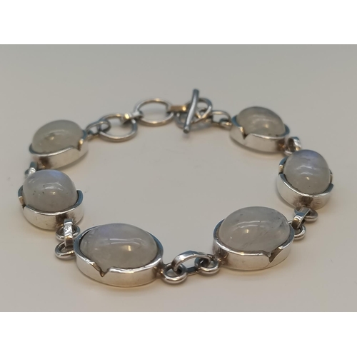 275A - Unmarked Silver Moonstone Set Bracelet.