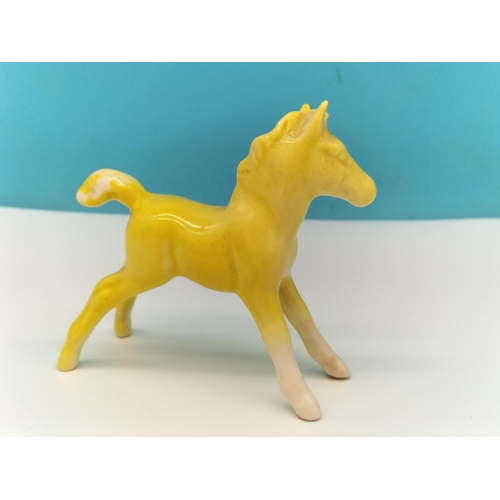 47 - Rare Beswick Yellow Foal, possibly Prototype. 9cm x 9cm.