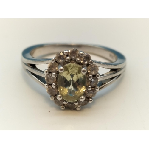 55A - 925 Silver Ring set with Pale Green and Clear Stones. Size O.