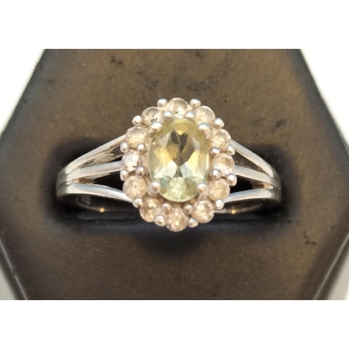 55A - 925 Silver Ring set with Pale Green and Clear Stones. Size O.