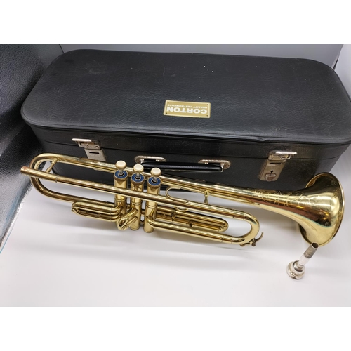 672 - Cased Corton Trumpet.