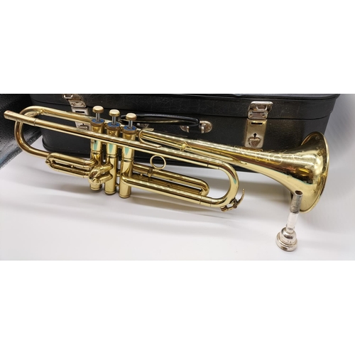 672 - Cased Corton Trumpet.