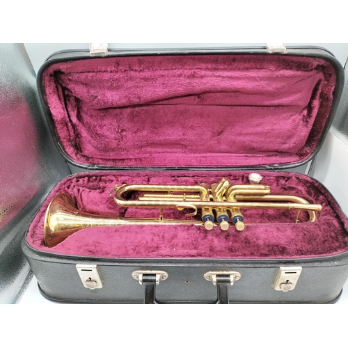 672 - Cased Corton Trumpet.