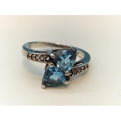 682 - 925 Silver Ring set with Blue and Clear Stones. Size S.