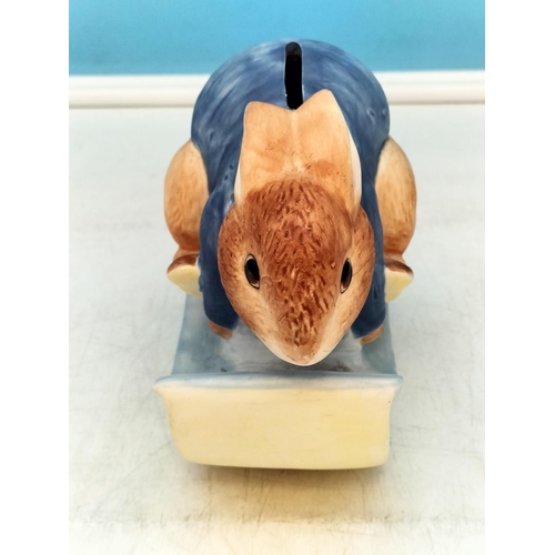 703 - Border Fine Arts Peter Rabbit Money Box A1327. 14cm x 14cm.