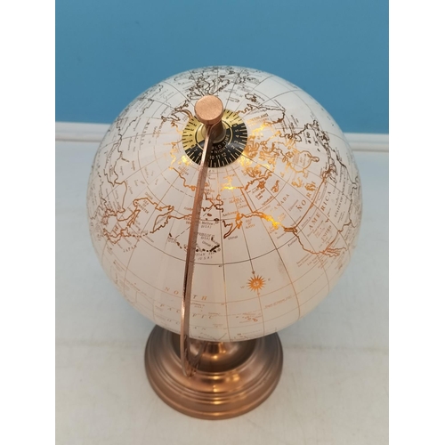 705 - Globe on Stand. 31cm Tall.