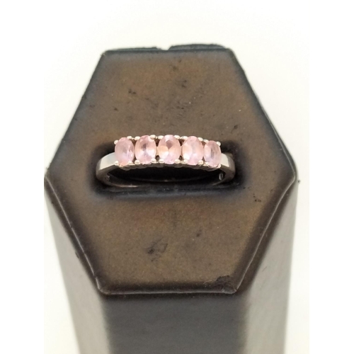 80A - 925 Silver Ring set with Pink Stones. Size Q.