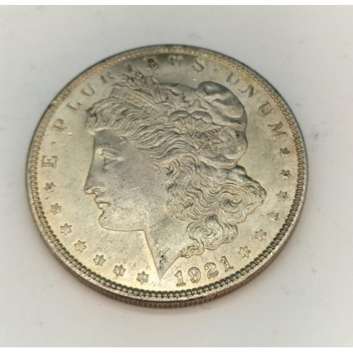 233 - 1921 .900 Silver Morgan Dollar.