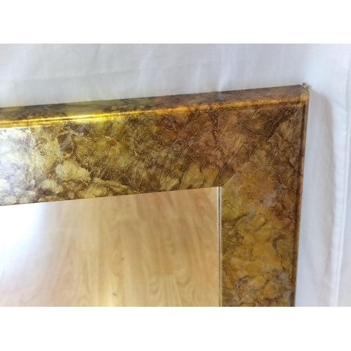 779 - Gold Marble Effect Framed Wall Mirror. 87cm x 62cm. Collection Only.