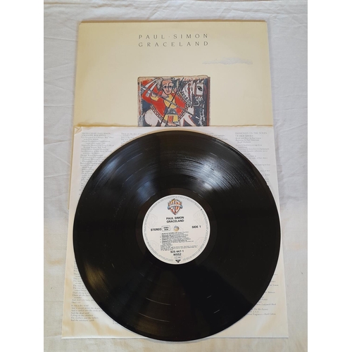 163 - Paul Simon Related Collection of Lp WX 340 The Rhythm Of The Saints 1-A2 1-B2, WX 52  Graceland A3-B... 