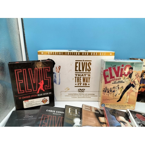 200 - Quantity of Elvis Presley DVDs and CDs.