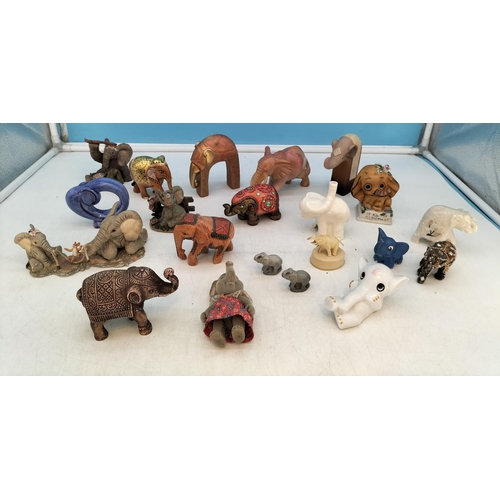 231 - Collection of Elephant Figures. Largest 9cm High x 14cm.