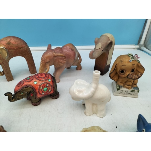 231 - Collection of Elephant Figures. Largest 9cm High x 14cm.