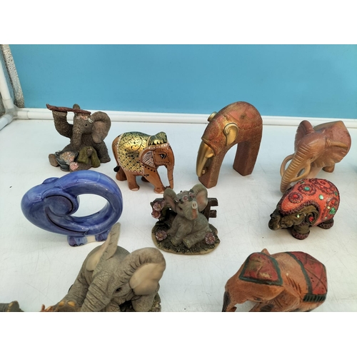 231 - Collection of Elephant Figures. Largest 9cm High x 14cm.