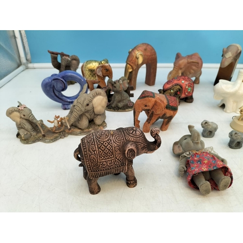 231 - Collection of Elephant Figures. Largest 9cm High x 14cm.