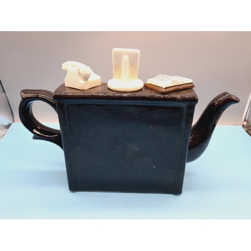 265 - Large Carters of Suffolk 'Tea for Two' Piano Teapot. 23cm High, 32cm x 12cm.