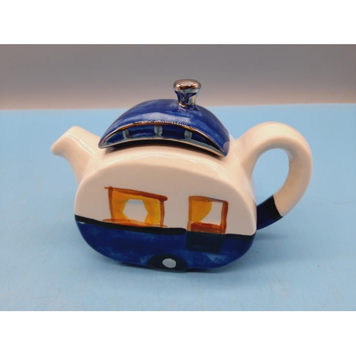 281 - Carters of Suffolk Novelty Teapots (4) to include 'Lighthouse', 'Titanic', 'Caravan' and 'Beach Hut'... 