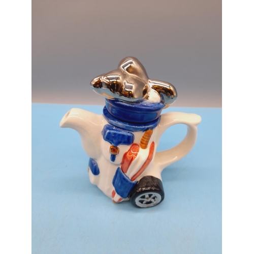 351 - Carters of Suffolk Novelty Teapots (5) to include Racing Car, Golf Bag with Clubs, Artist Table, Bre... 