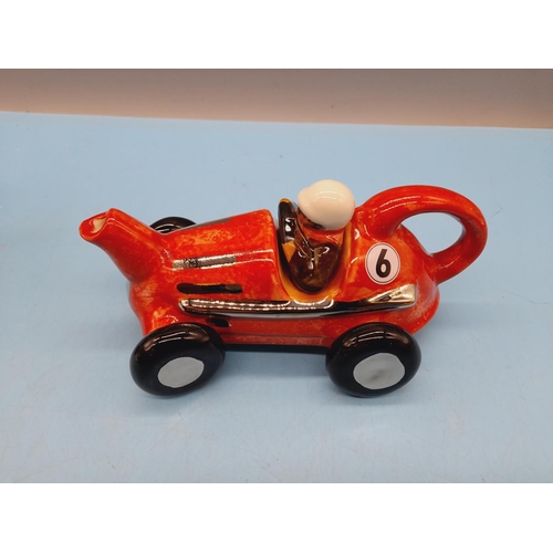 351 - Carters of Suffolk Novelty Teapots (5) to include Racing Car, Golf Bag with Clubs, Artist Table, Bre... 