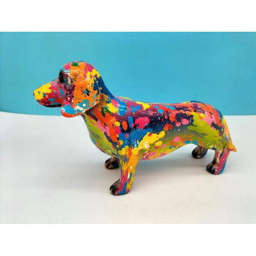 398 - Multi Coloured Figure of a Dog. 16cm High x 25cm.