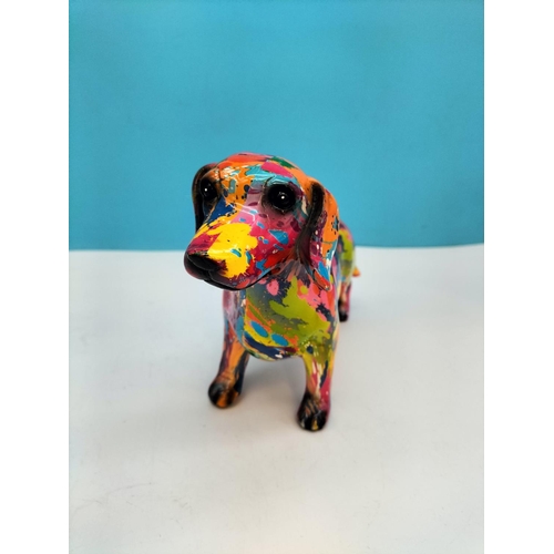 398 - Multi Coloured Figure of a Dog. 16cm High x 25cm.