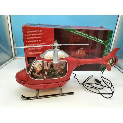 60 - Boxed Indoor Christmas 'Santa in Helicopter' Decoration W/O. 22cm High, 47.5cm Long.