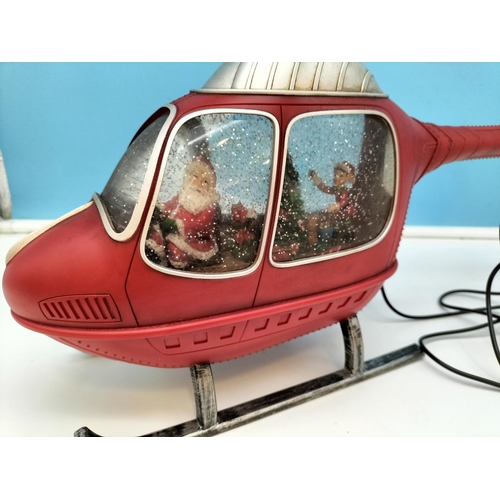 60 - Boxed Indoor Christmas 'Santa in Helicopter' Decoration W/O. 22cm High, 47.5cm Long.