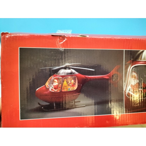 60 - Boxed Indoor Christmas 'Santa in Helicopter' Decoration W/O. 22cm High, 47.5cm Long.