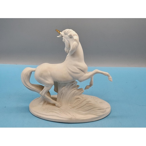 620 - David Cornell Porcelain The Spirit of Romance Unicorn Figure. A/F Horn Re glued.  19cm High x 20cm.