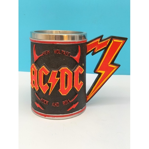 81 - Nemesis Now AC/DC Tankards (2) plus a Motorhead Tankard. Tallest 16cm