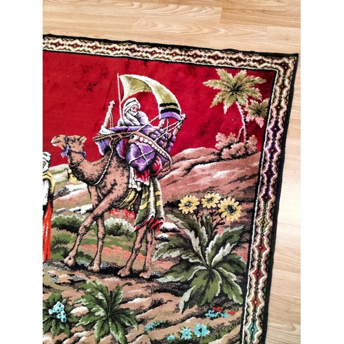 371 - Arabic Fabric Wall Hanging depicting Camels in an Oasis Scene. 172cm x 120cm.