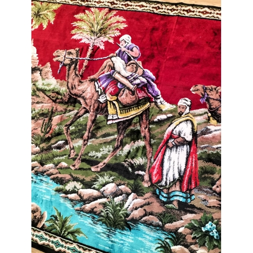 371 - Arabic Fabric Wall Hanging depicting Camels in an Oasis Scene. 172cm x 120cm.