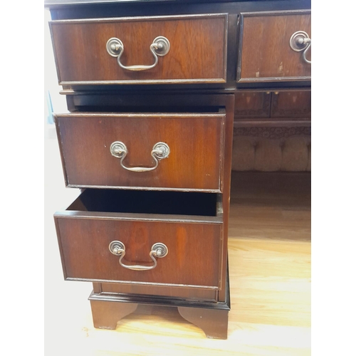 112 - Mahogany Green Leather Topped Pedestal Desk. 76cm High, 122cm x 61cm. Collection Only.