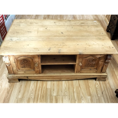 115 - Large Rustic Pine Coffee Table. Damage to One Cupboard Door. 120cm x 80cm x 45cm. Collection Only.