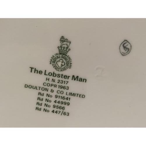 118 - Royal Doulton 20cm Figure 'The Lobster Man' HN 2317. Seconds Quality.