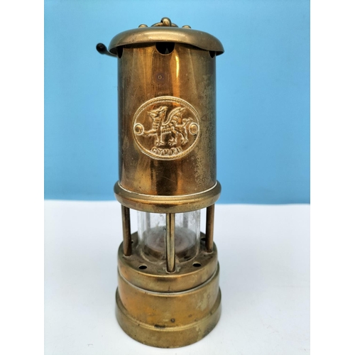 143 - Brass Cymru Welsh Musical Miners Lamp W/O. 16.5cm High.