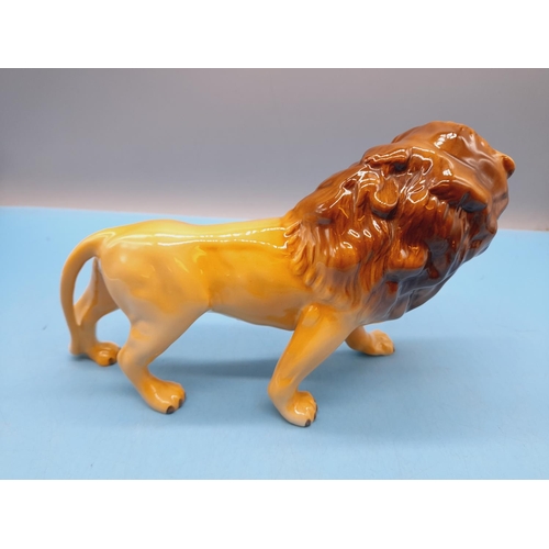 28 - Beswick Figure of a Lion. 14cm High x 25cm.