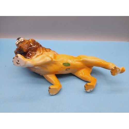 28 - Beswick Figure of a Lion. 14cm High x 25cm.