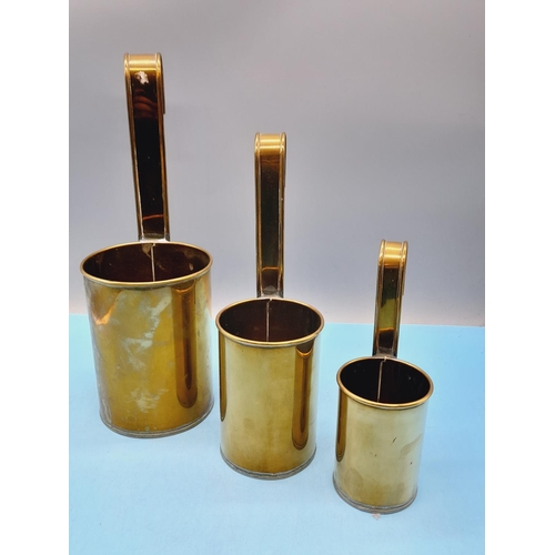 312 - Graduated Set of 3 Brass Measure Ladles. Tallest 30cm.