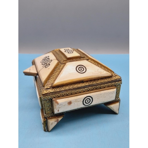 313 - Middle Eastern Brass and Bone Hinged Trinket Box. 8cm High, 13cm x 11cm.