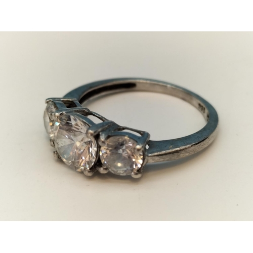 332 - 925 Silver and Clear Stone Trilogy Ring. Size N.