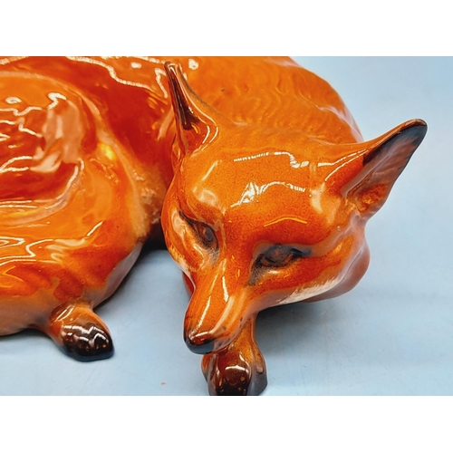 46 - Beswick Figure of a Lying Fox. 10cm x 9cm.