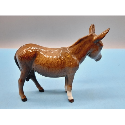 47 - Beswick Figure of a Donkey. 12cm High x 15cm.