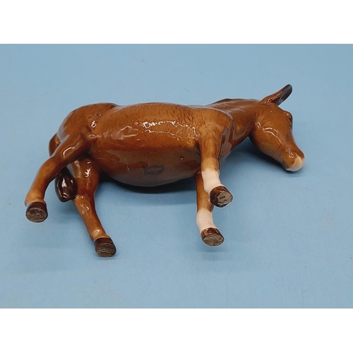 47 - Beswick Figure of a Donkey. 12cm High x 15cm.