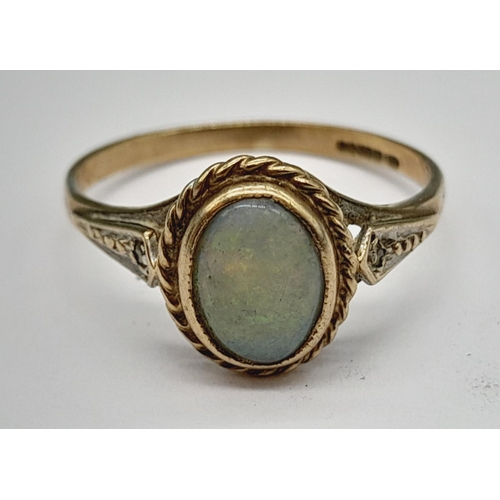 632 - 9ct Gold and Opal Ring. Size M.