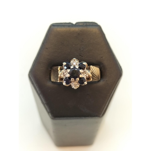 9 - 9ct Hallmarked Gold Diamond and Sapphire Ring. Size O. Total Weight 4.3 Grams.