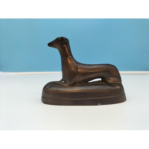 157 - Bronze Figure of a Dog. 9cm High x 12cm.