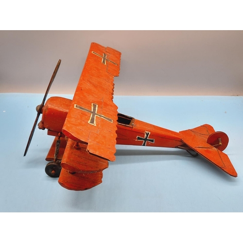 32 - Tin Plate Model of a WWI German (Red Baron) Plane. 18cm High, 35cm x 37cm.